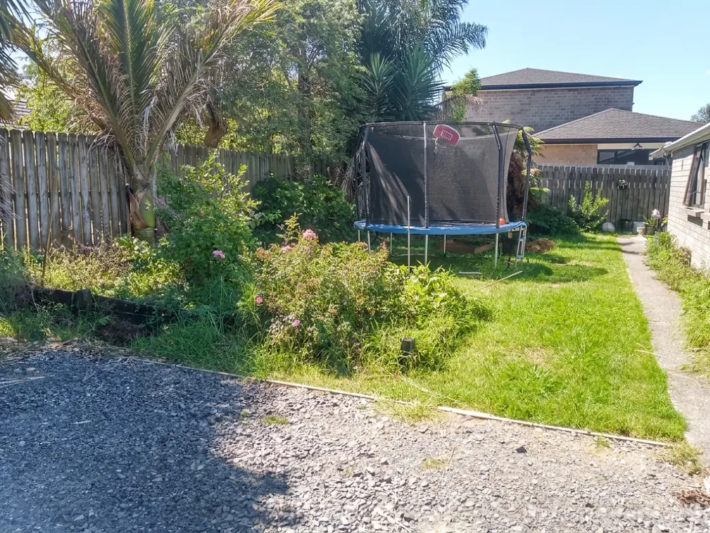 Before: Backyard artificial grass installation in Henderson, West Auckland
