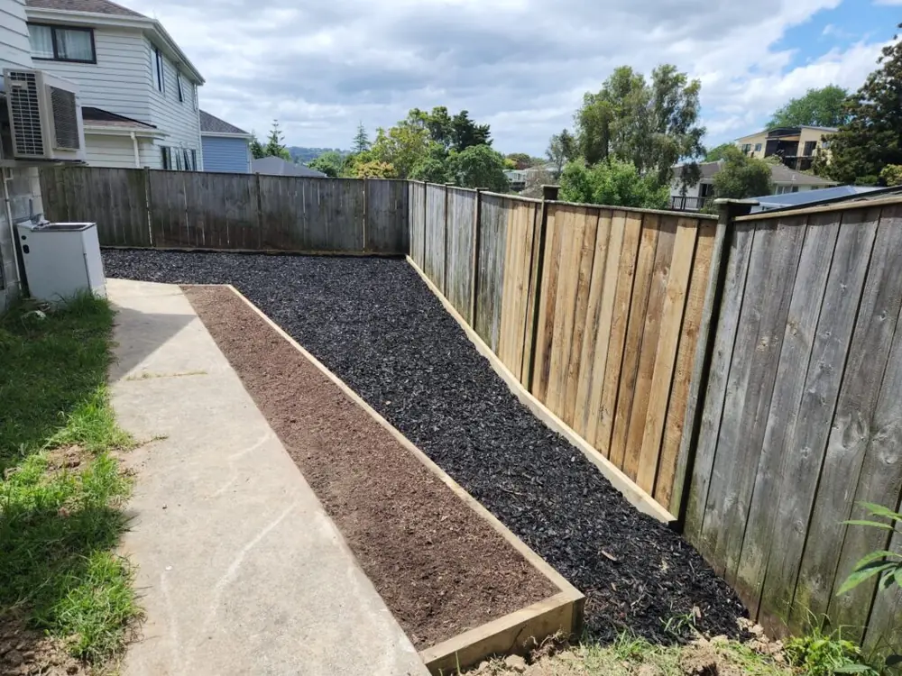After: Retaining wall and backyard landscaping in Ranui, West Auckland